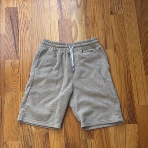Tan Athletic Shorts with Elastic Waistband and Soft Fabric